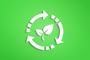 Recycle symbol on green background