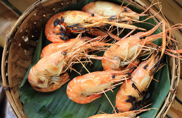 Roasted grilled giant river shrimp or prawn served on natural plate, Thai style food at a Thai restaurant.