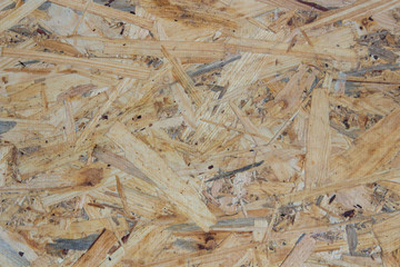 texture Oriented strand board,background of pressed OSB plate, wood plate with wood waste