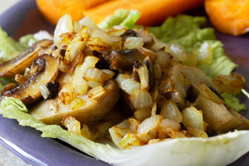 fried champignon with lettuce and onions 
