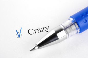 Crazy. Filling in the questionnaire, documents. The checkboxes are filled with a black pen on a white background. Questionnaire, survey.