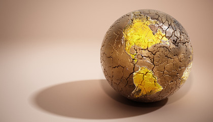 Cracked globe on soft background