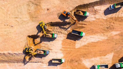 Aerial view excavator working on a construction site.