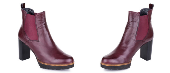 Pair of classical woman leather ankle boots booties shoes. Two isolated.