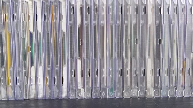 Group of CD or compact discs on table