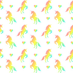 Vector seamless pattern of rainbow unicorn silhouette and hearts isolated on white background