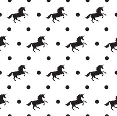 Vector seamless pattern of black unicorn silhouette and dots isolated on white background