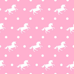 Fototapeta premium Vector seamless pattern of white unicorn silhouette and dots isolated on pastel pink background