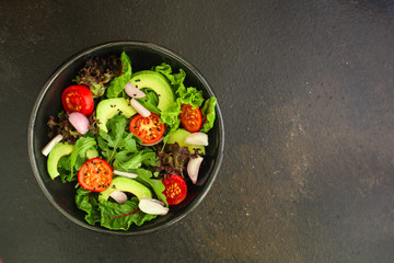 salad healthy, vegetables (avocado, tomato, mix leaves, arugula, lettuce, onions and more) top menu concept. food background. copy space
