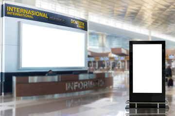 two blank advertising billboard at airport background large LCD advertisement
