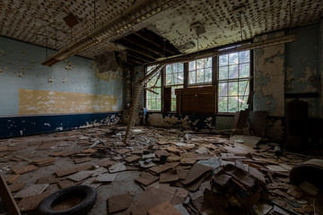 Fototapeta na wymiar Derelict Classroom with Broken Windows - Abandoned Silver Creek School - New York