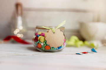 Happy Birthday - colourful candy in glass with paper tag