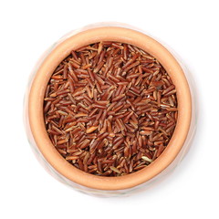 Red wild rice pile in clay pot isolated on white background, top view