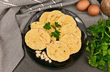 Carlsbad bread dumplings (German name is Serviettenknödel)..European menu.