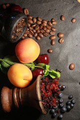 bowl with tobacco for hookah. fruits on a black background