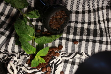 bowl with tobacco for hookah. fruits on a black background