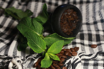 bowl with tobacco for hookah. berries on a black background