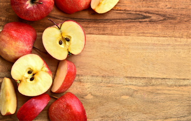 Top view a lot of  fresh Gala red apple isolated on wooden background with space for text.