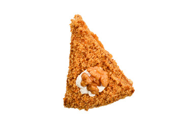 Peace of honey cake isolated on white background.