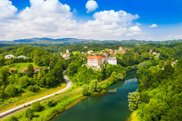 Beautiful old castle of Ozalj, aerial drone view of the river Kupa in the town of Ozalj, Croatia