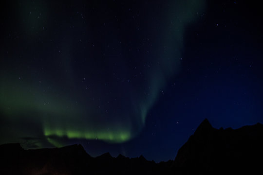 Northern lights above Reine in Lofoten islands in Norway