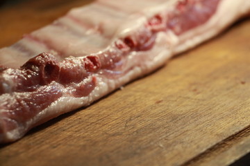 pork meat on wooden board