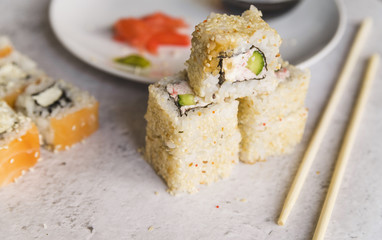 Piled up sushi with seeds