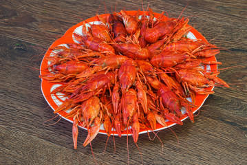 Still life with crayfish crawfish on old wooden background