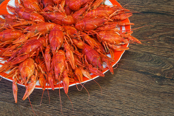 Still life with crayfish crawfish on old wooden background