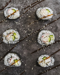 Close up shot sushi rolls with sesame seeds