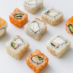 Close up view of arranged assortments of sushi