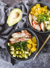 Rice bowls with avocado and vegetables