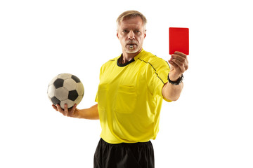 Referee holding ball and showing a red card to a football or soccer player while gaming on white...
