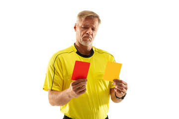 Referee showing a red and yellow cards to a football or soccer player while gaming on white studio...
