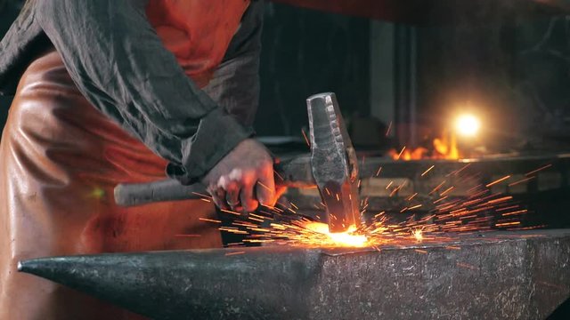 Burning iron is getting hammered in the smithy