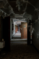 Derelict Hallway with Open Doors + Broken Glass - Abandoned Rockland State Hospital - New York