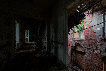 Fototapeta na wymiar Collapsing Patient Rooms - Abandoned Brownsville Hospital - Brownsville, Pennsylvania