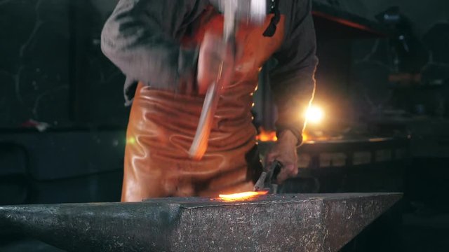 Hammersmith is beating inflamed metal in slow motion. Slow motion.