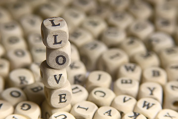 cubes letters love inscription / message from small letters, the concept of romance love, inscription love unusual font