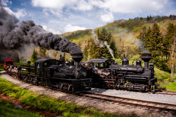 Fototapeta na wymiar Antique Steam Shay Locomotive Trains + Billowing Smokestack - Historic Cass Scenic Railroad - West Virginia