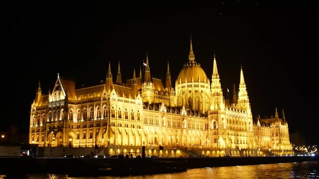 Budapest Hungarian Parliament and night time on the Danube river, Budapest, Hungary, Holidays in Budapest