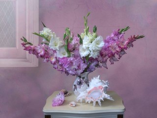 Fototapeta premium Still life with splendid bouquet of gladiolus flowers