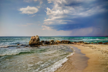 Stormy skies approaching a Greek beach resort