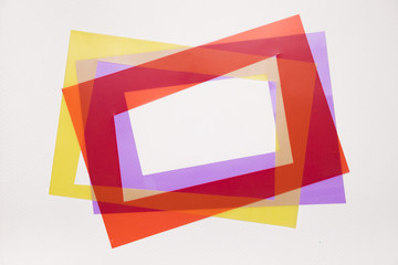 Tilt red; yellow and purple frame on white background