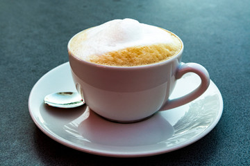 Italian coffee capuccino with foaming milk