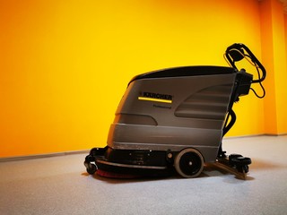 A large floor polisher, scrubber