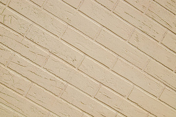 Brick-plastered and painted wall as background