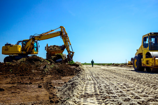 Trace Of Huge Road Roller With Spikes To Compact Soil At Construction Site