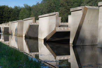 Waterloopbos, The Netherlands, August 25, 2019: the concrete national monument, reflecting in the...