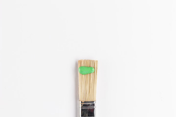 Top view of green paint on brush